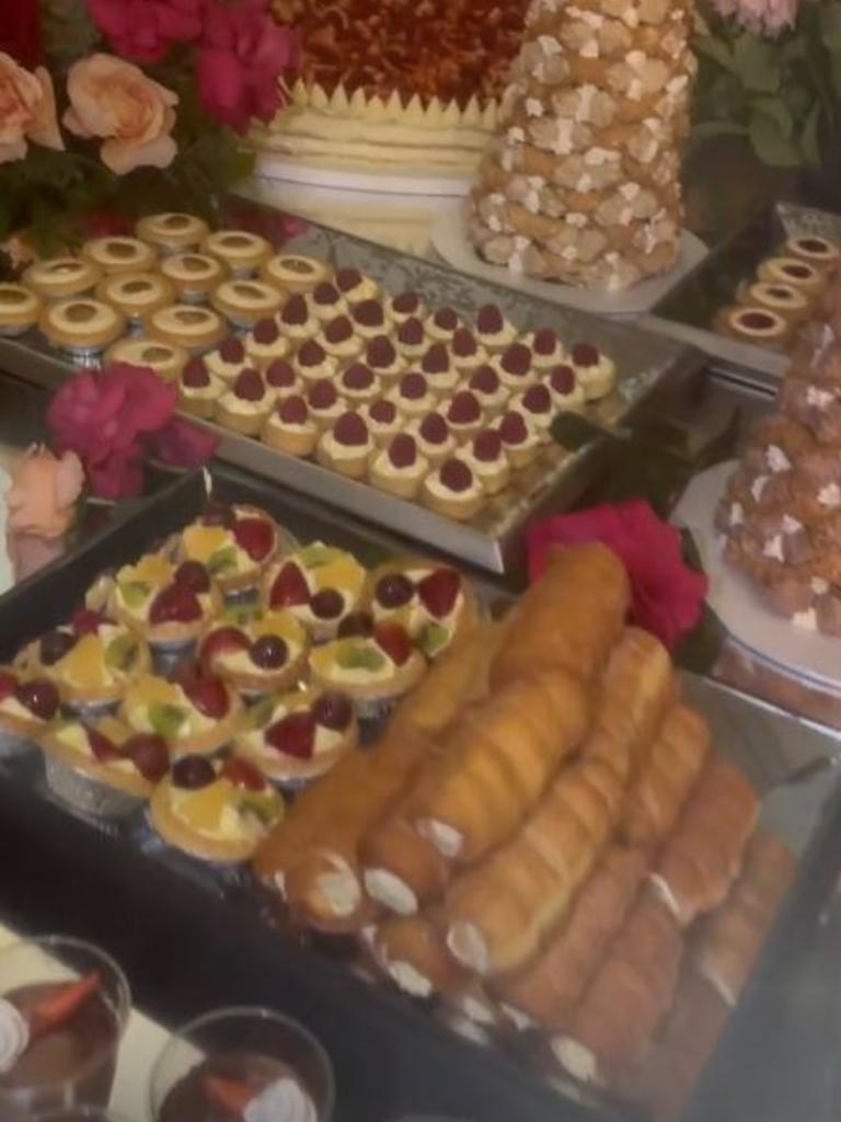 The catering included a huge table of cakes and pastries.