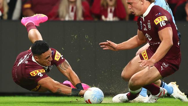 BRISBANE, AUSTRALIA – JUNE 21: Valentine Holmes of the Maroons scores a try during game two of the State of Origin series between the Queensland Maroons and the New South Wales Blues at Suncorp Stadium on June 21, 2023 in Brisbane, Australia. (Photo by Chris Hyde/Getty Images)