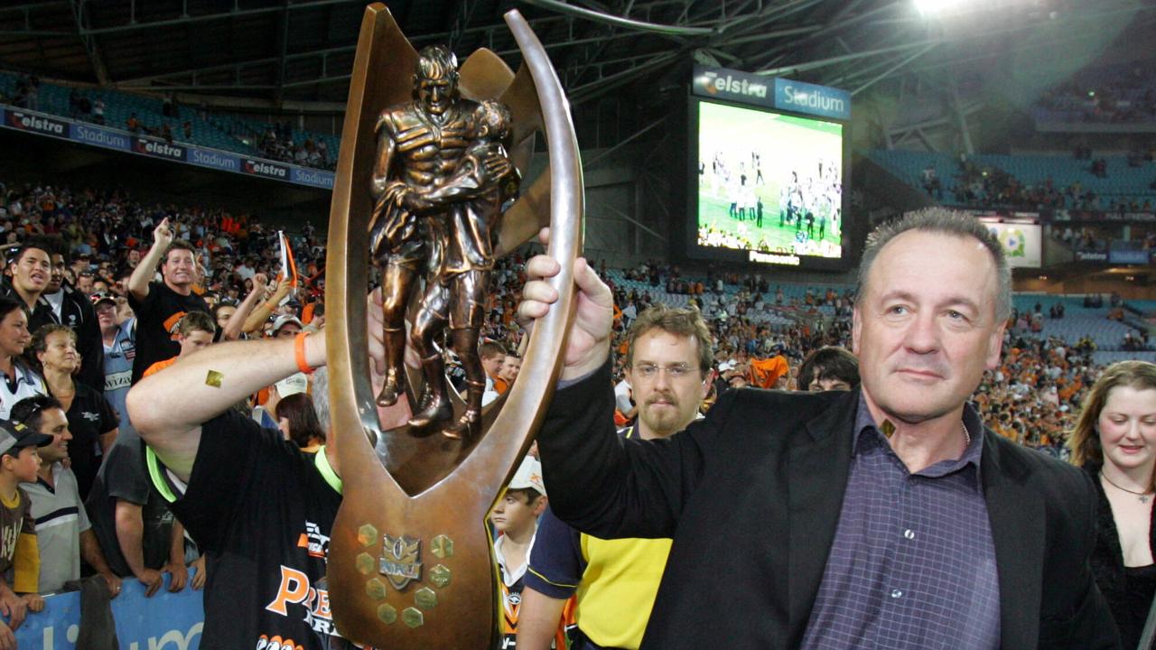 Tim Sheens with the 2005 premiership trophy. Picture: Darren England