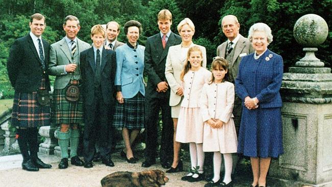 Princes Andrew, Charles, Harry, and Edward, Princess Anne, Prince William, Zara Phillips, Princess Beatrice, Princess Eugenie, Prince Philip and the Queen at Balmoral in 1999.