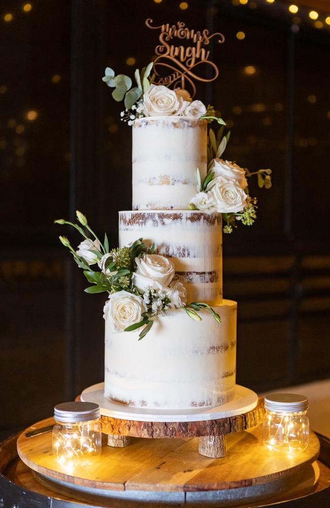 The three-tiered wedding cake by Sweet Philosophy. Picture: Salt Studios