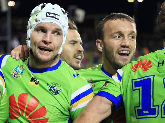 SYDNEY, AUSTRALIA - JUNE 17:  Nick Cotric of the Raiders (L) celebrates a try with Jarrod Croker and Josh Hodgson during the round 15 NRL match between the Wests Tigers and the Canberra Raiders at Campbelltown Sports Stadium on June 17, 2018 in Sydney, Australia.  (Photo by Mark Evans/Getty Images)