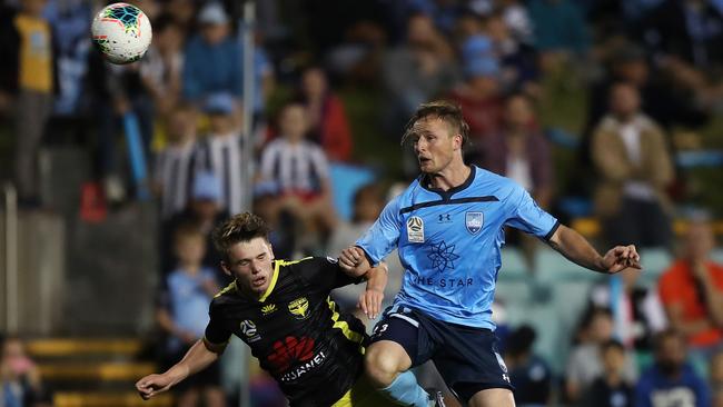 Rhyan Grant wins a header. Picture: Brett Costello