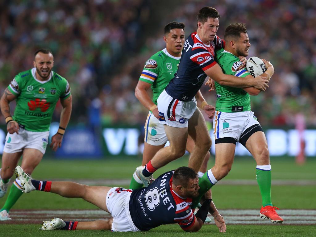 SYDNEY, AUSTRALIA - OCTOBER 06: Aidan Sezer of the Raiders is tackled by Sam Verrills of the Roosters and Jared Waerea-Hargreaves of the Roosters during the 2019 NRL Grand Final match between the Canberra Raiders and the Sydney Roosters at ANZ Stadium on October 06, 2019 in Sydney, Australia. (Photo by Jason McCawley/Getty Images)