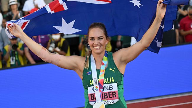 Australia's Kelsey-Lee Barber celebrates with her medal after winning the women's javelin throw final during the World Athletics Championships at Hayward Field in Eugene, Oregon on July 22, 2022. (Photo by ANDREJ ISAKOVIC / AFP)