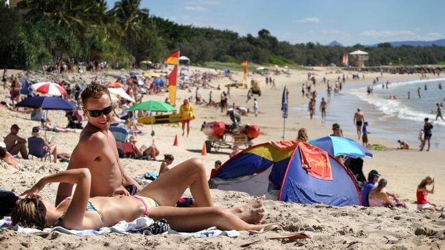 Taneille Duffy, 22 and Brett Leftwich, 21 from Brisbane relaxing on Labour Day holiday at Noosa Beach in 2006.