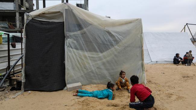 <font><font><font><font><font><font>Displaced Palestinian children are pictured along with makeshift tents in the so-called safe zone. Picture: Ahmad Hasaballah</font></font></font></font></font></font>