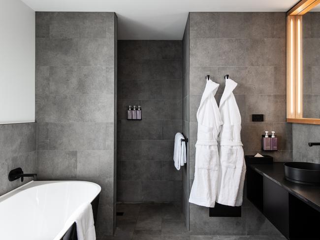 One of the bathrooms complete with freestanding bath and plush robes, in one of the Hotel Verge's Ultimate rooms. Picture: ANJIE BLAIR