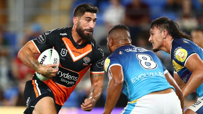 GOLD COAST, AUSTRALIA - MARCH 31: James Tamou of the Tigers runs the ball during the round four NRL match between the Gold Coast Titans and the Wests Tigers at Cbus Super Stadium, on March 31, 2022, in Gold Coast, Australia. (Photo by Chris Hyde/Getty Images)