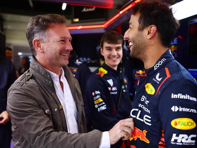 File Photo: Australian Driver Daniel Ricciardo Joins AlphaTauri For Remainder Of 2023 F1 Season - NORTHAMPTON, ENGLAND - JULY 11:  Daniel Ricciardo of Australia and Oracle Red Bull Racing speaks with Red Bull Racing Team Principal Christian Horner as he prepares to drive during Formula 1 testing at Silverstone Circuit on July 11, 2023 in Northampton, England. (Photo by Mark Thompson/Getty Images)