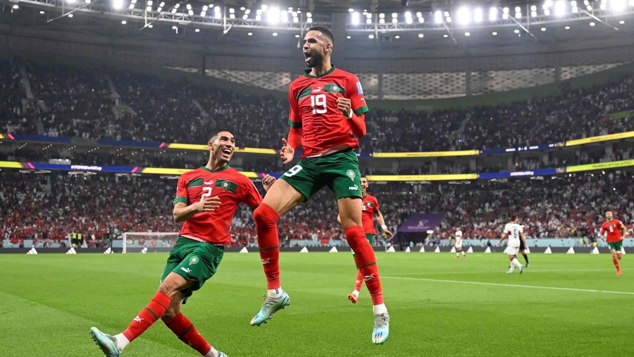 Morocco's forward Youssef En-Nesyri celebrates his goal. (Photo by PATRICIA DE MELO MOREIRA / AFP)