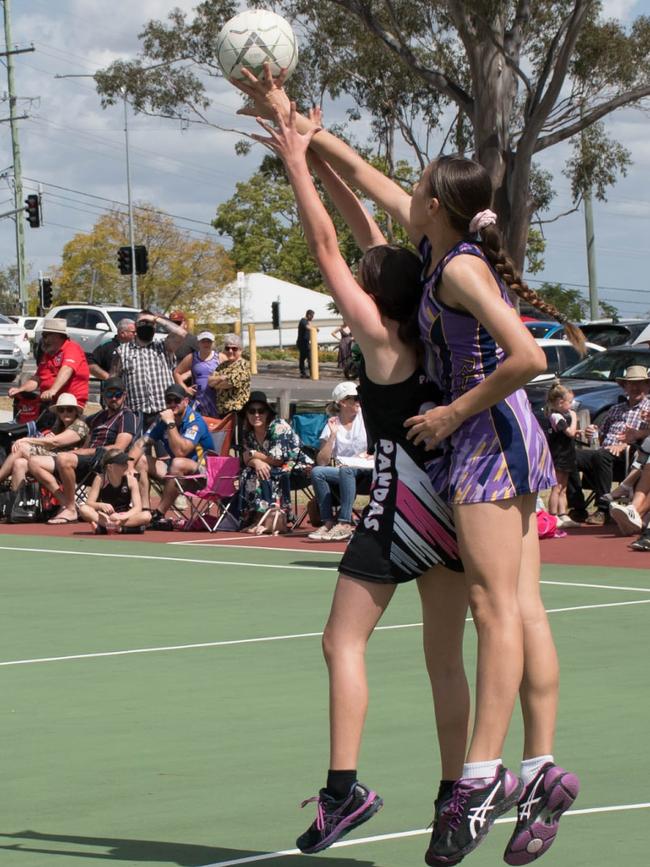 A tight tussle in the 14/15 years Division 2 grand final between Rebels 9 and Pandas 9. Picture: Gary Reid