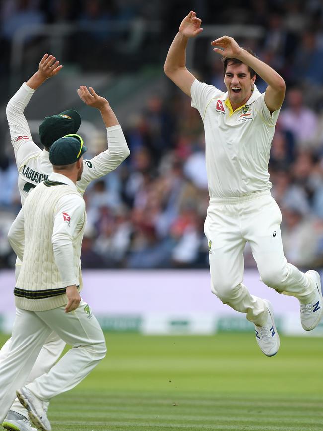 Pat Cummins celebrates with teammates on day four. Picture: Getty Images