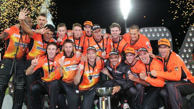 Perth Scorchers enjoy the spoils of their BBL04 triumph.