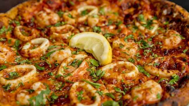 Justin Lane’s popular prawn and calamari pizza. Picture: Jerad Williams