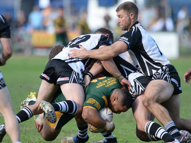 (L-R) Alex Peters and Kiel Shephard flatten a Lions raid. Picture: Ian Svegovic