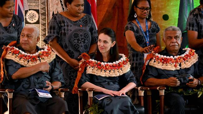 Fiji's Prime Minister Frank Bainimarama (L), Jacinda Ardern (C) and Vanuatu's Prime Minister Bob Loughman (R) at the Pacific Islands Forum last week. Picture: AFP.