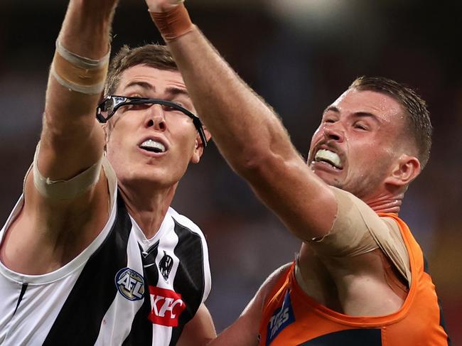 Mason Cox and Kieren Briggs contesting the ruck on Saturday night. Picture: Cameron Spencer/Getty Images.