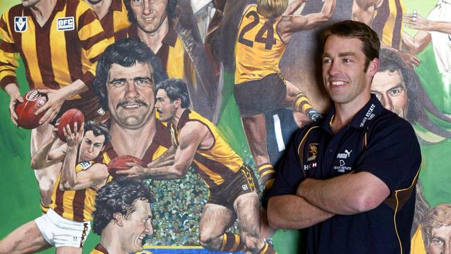 Coach Alastair Clarkson with mural after being named Hawks coach. Picture: Michael Dodge.