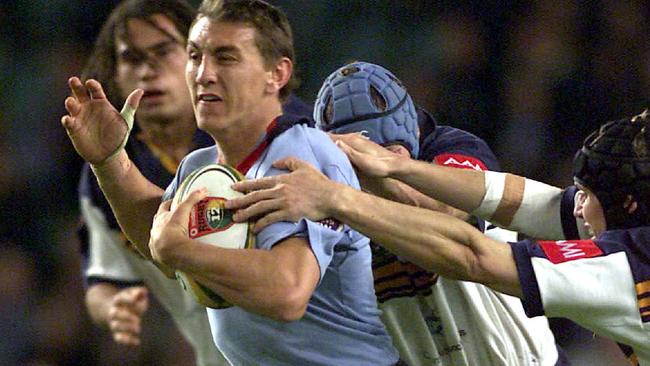 Mat Rogers in action during his early days with the Waratahs.