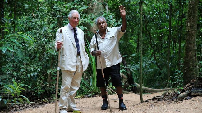 Kuku Yalanji elder Roy Gibson and founding member of the Mossman Gorge Tourist Centre, provides Prince Charles with a traditional cultural tour during his visit to Mossman Gorge, Far North Queensland. PICTURE: JUSTIN BRIERTY