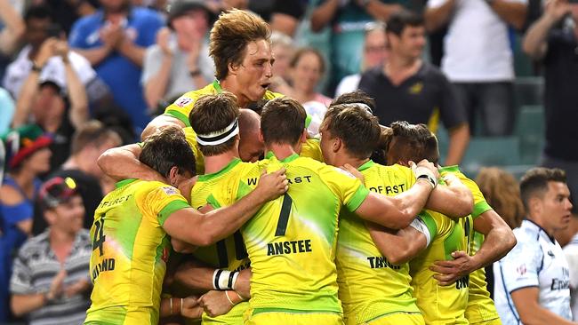 Australia celebrate victory after defeating South Africa at Allianz Stadium.