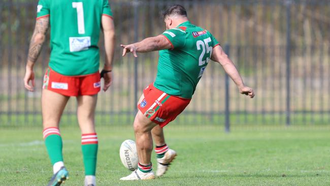 The magic moment Josh McConnell kicks a field goal from 35m to win the game for the Corrimal Cougars 1st Division. Picture: Steve Montgomery | OurFootyTeam