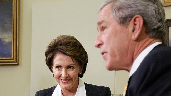 Former President George W Bush pictured with then new Democratic US House of Representatives leader Nancy Pelosi in 2006.. Picture: AFP