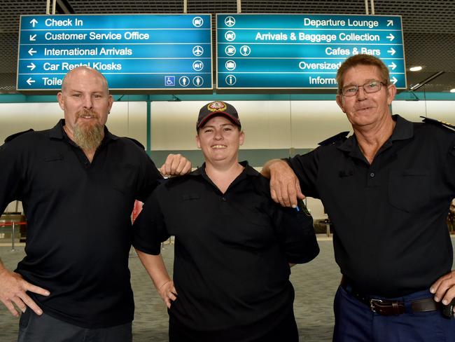 Rural fire fighters  David Redsell from Abbot Point, Kimberleigh Smith from Mt Isa and Bernard van der Dolder from Bluewater at Townsville Airport. Picture: Evan Morgan