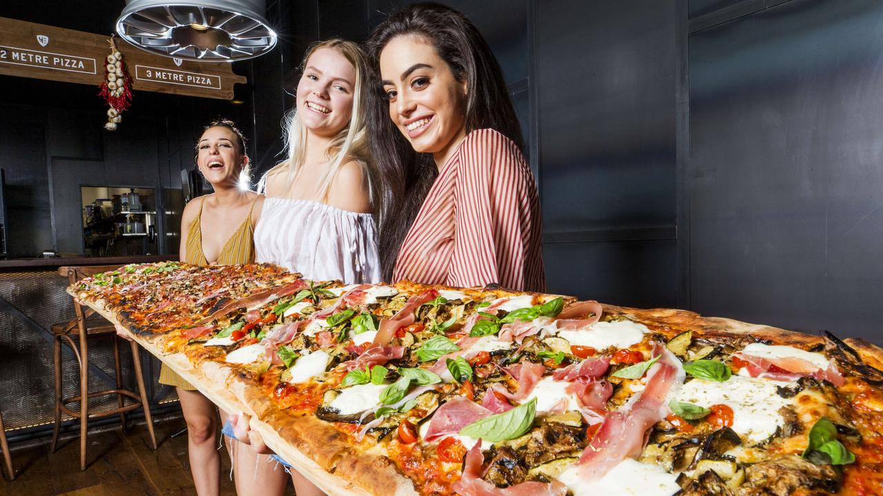 Meet Queensland’s biggest pizza at a whopping 3m long | The Courier Mail