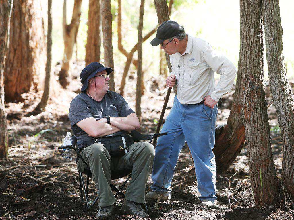 Grave expert Tony Lowe, left at digger, and hydrologist Jon Olley have returned to the search scene. Picture: NCA NewsWire/Peter Lorimer