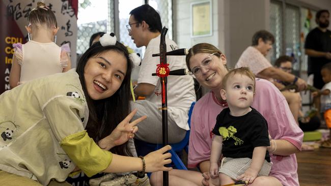 Alex Chan, Kade Coles and Maddie Rogers as families enjoy a day of fun and activities at a special Harmony Day celebration at the Malak Community Centre as part of the Fun Bus program. Picture: Pema Tamang Pakhrin