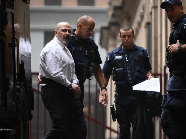 Tony Mokbel (left) arrives at the Supreme Court of Victoria in Melbourne, Monday, November 25, 2024. (AAP Image/Joel Carrett) NO ARCHIVING