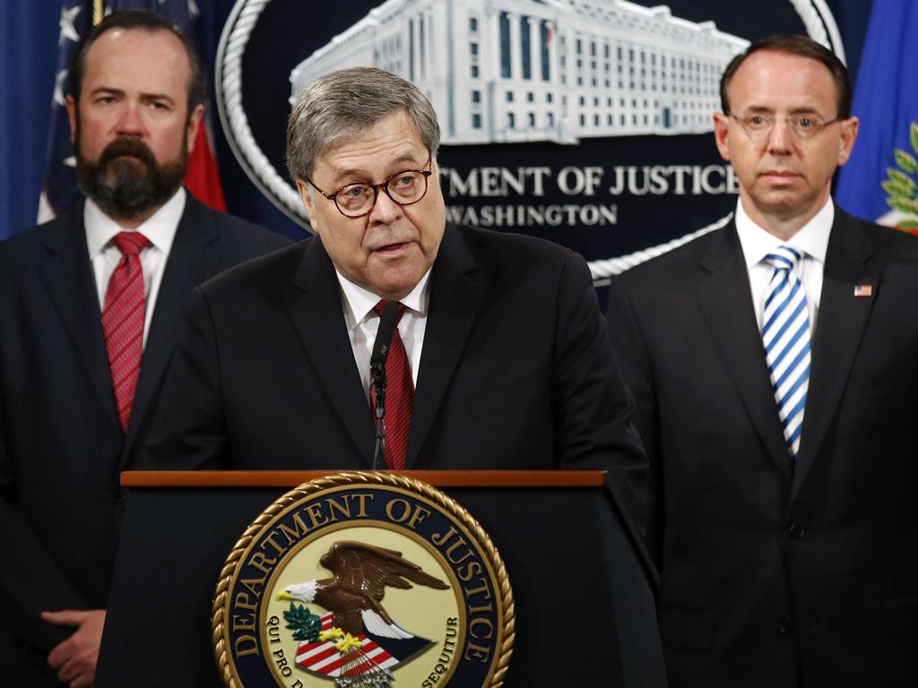 Attorney General William Barr speaks alongside Deputy Attorney General Rod Rosenstein, right, and acting Principal Associate Deputy Attorney General Edward O'Callaghan, left, about the release of a redacted version of special counsel Robert Mueller's report. Picture: AP