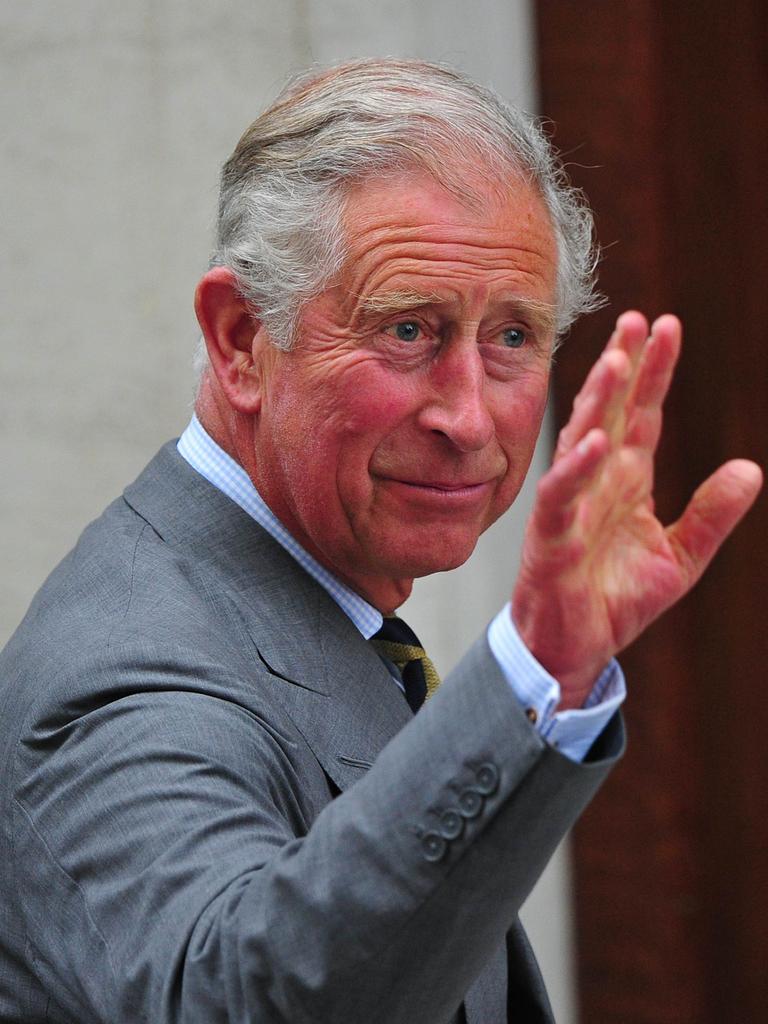 Prince Charles (L) and his wife Camilla, Duchess of Cornwall, arrive at the St Mary's Hospital in London, on July 23, 2013. Britain's Prince William and his wife Kate on Tuesday thanked staff at the hospital where their baby son was born, as the world waited for a name and hopefully a glimpse of the future king. AFP PHOTO / CARL COURT