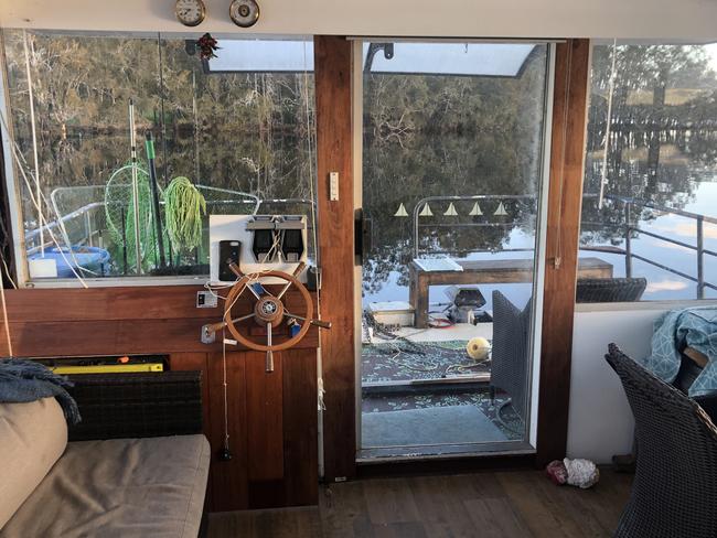 Enjoy life on the water with this off-grid houseboat. Picture: Supplied.