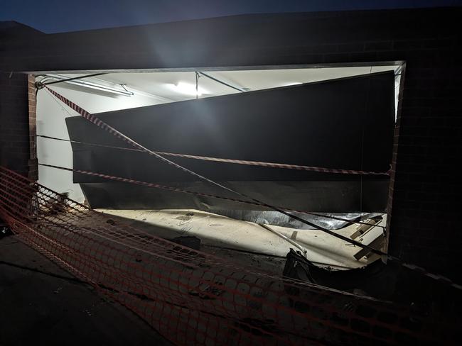 The garage at the share house after Tsai-Wei Hung repeatedly rammed it with her car.