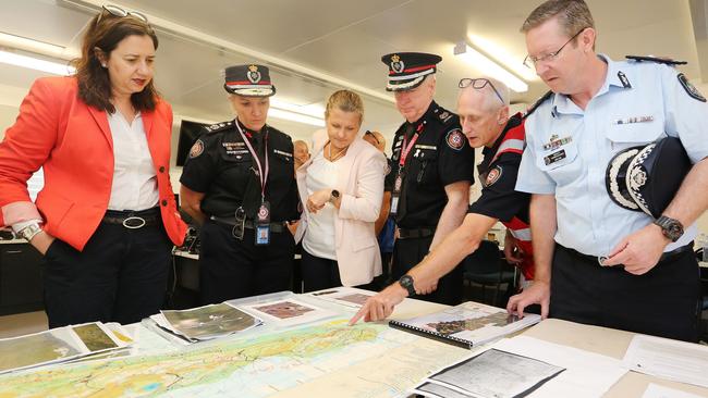 Annastacia Palaszczuk with emergency services personnel on North Stradbroke Island. Picture: Jack Tran/Office of the Premier.