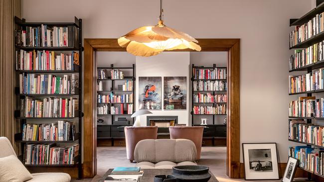 A Sydney philanthropist's home filled with art, books and iconic furniture. Photographed by Ross Honeysett and interior architecture by Don Cameron.