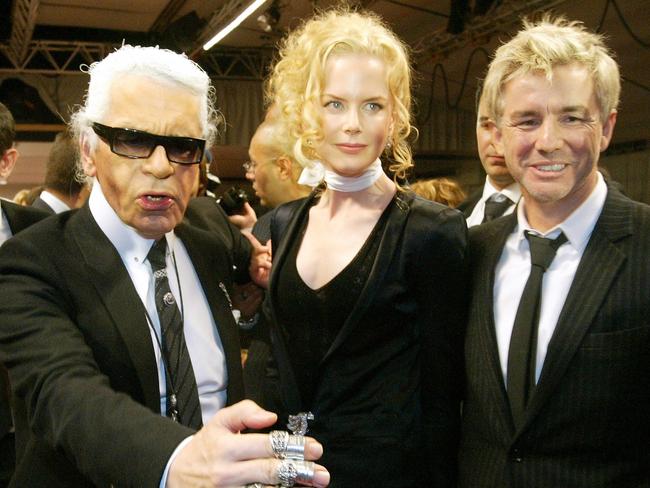 Karl Lagerfeld with Nicole Kidman and Baz Luhrman at a Chanel show in Paris in 2005.  