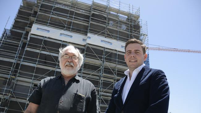 SKY HIGH: Inspire South Central developer Barry Bernoth (left) and LJ Hooker chief operating officer Jeremy Lewis celebrate the launch of the massive multistorey building onto the market, with units starting from $490,000.