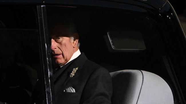 King Charles III reacts as he leaves at the end of a Vigil at St Giles' Cathedral, in Edinburgh on September 12. Picture: AFP