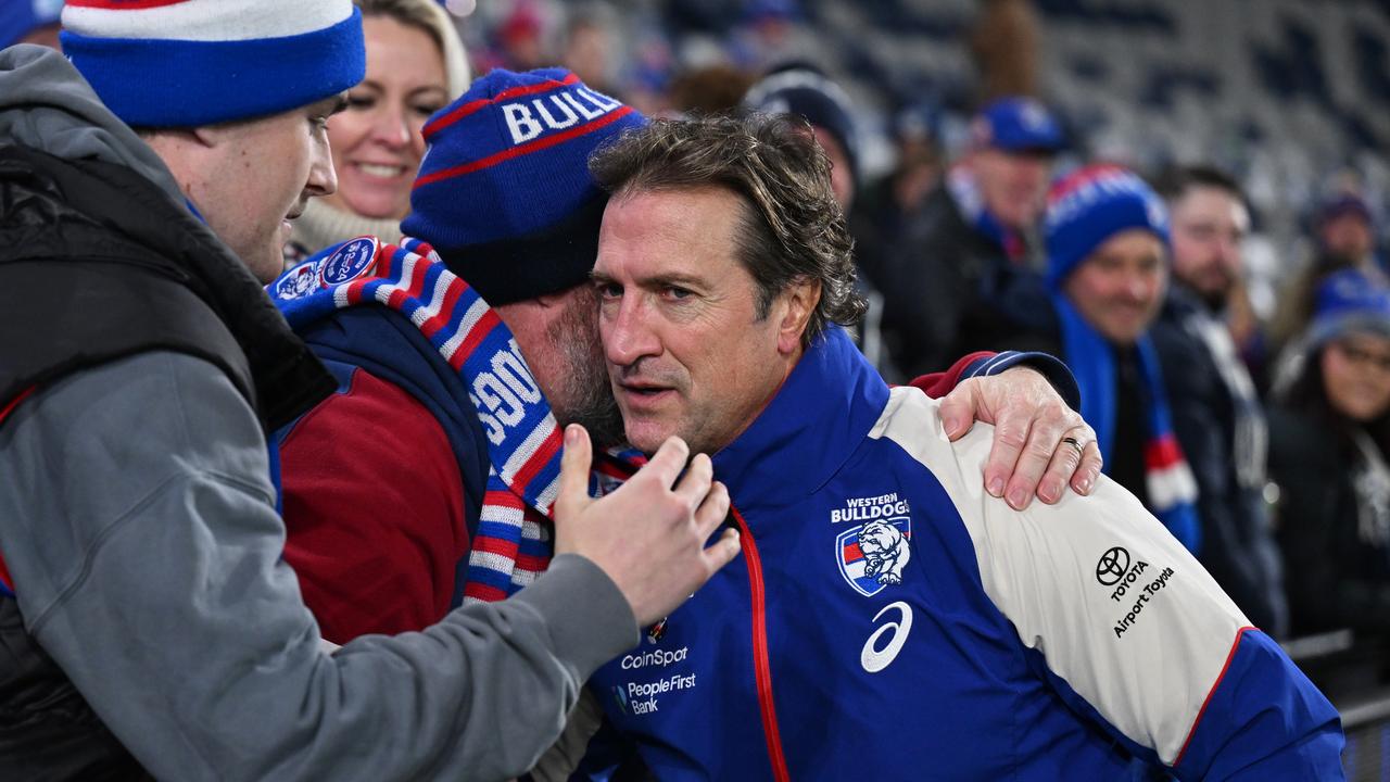 GEELONG, AUSTRALIA - JULY 20: Luke Beveridge, Senior Coach of the Bulldogs greets a fan after the round 19 AFL match between Geelong Cats and Western Bulldogs at GMHBA Stadium, on July 20, 2024, in Geelong, Australia. (Photo by Daniel Pockett/Getty Images via AFL Photos)