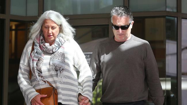 Jack Aston (right) leaving a court hearing with his wife before he was sentenced last year. Picture: Hamish Blair