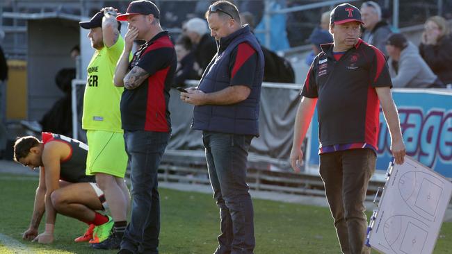 The dejected Tullamarine bench after the grand final at Windy Hill. Picture: Mark Dadswell