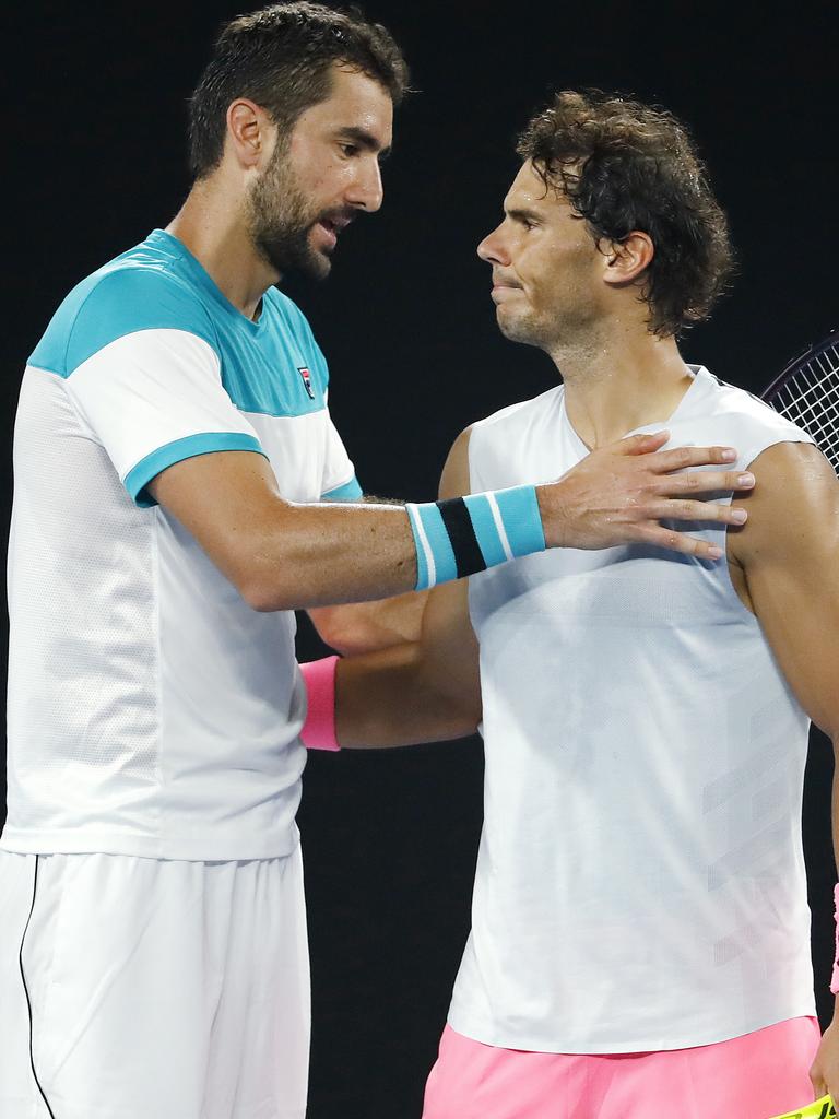 The moment Cilic made the semis when Rafa retired. .Pic: Michael Klein