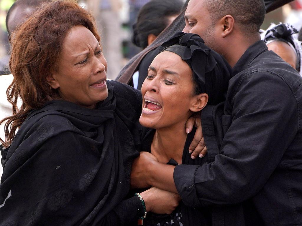Mourners, believed to be family members of a victim on-board the aircraft, visit the crash site of Ethiopian Airlines Flight ET302 on March 14, 2019 in Ejere, Ethiopia. Picture: Getty