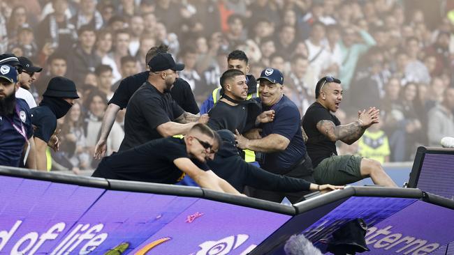 Fans storm the pitch at AAMI Park during last December’s Melbourne derby. Picture: Darrian Traynor/Getty Images
