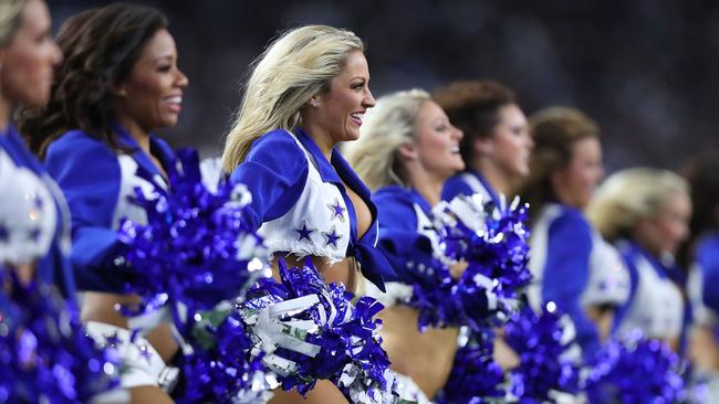 ARLINGTON, TX - NOVEMBER 05: The Dallas Cowboys Cheerleaders perform during the game against the Tennessee Titans at AT&amp;T Stadium on November 5, 2018 in Arlington, Texas. Tom Pennington/Getty Images/AFP == FOR NEWSPAPERS, INTERNET, TELCOS &amp; TELEVISION USE ONLY ==