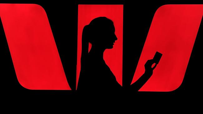 A woman approaches a Westpac bank automated teller machine (ATM) in Sydney, 17/02/2011.